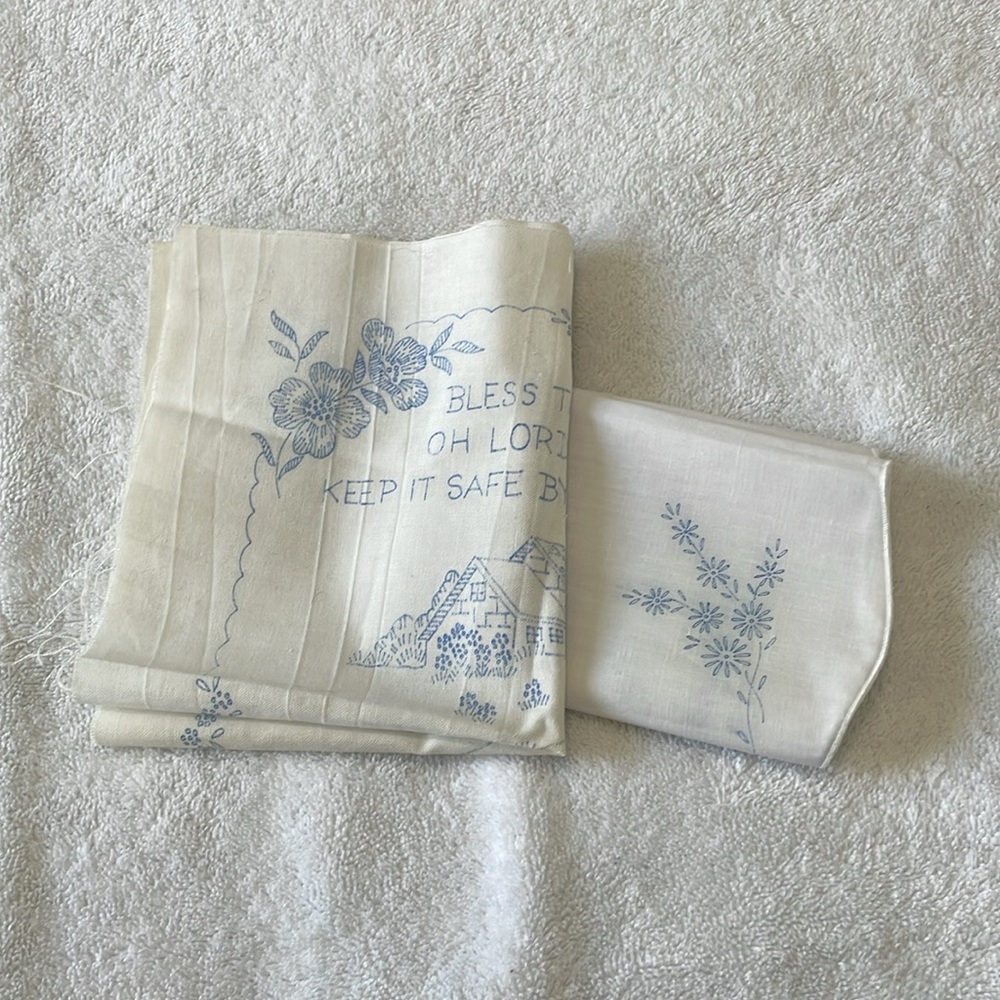 Two vintage stamped embroidery cloths